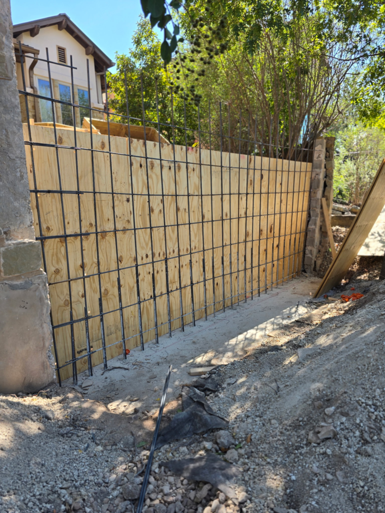 A retaining wall under construction.